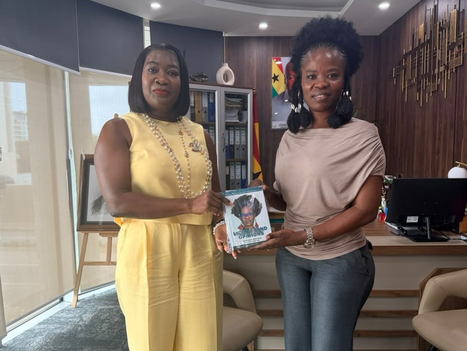 CEO of MIIF Justina Nelson Receives a Copy of Life Beyond Opinions from Author Ohemaa Woyeje